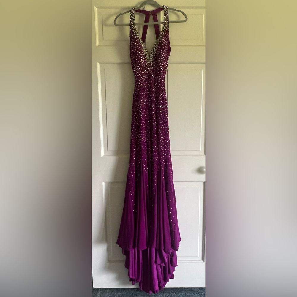 Gorgeous dark purple/fushia beaded gown.
